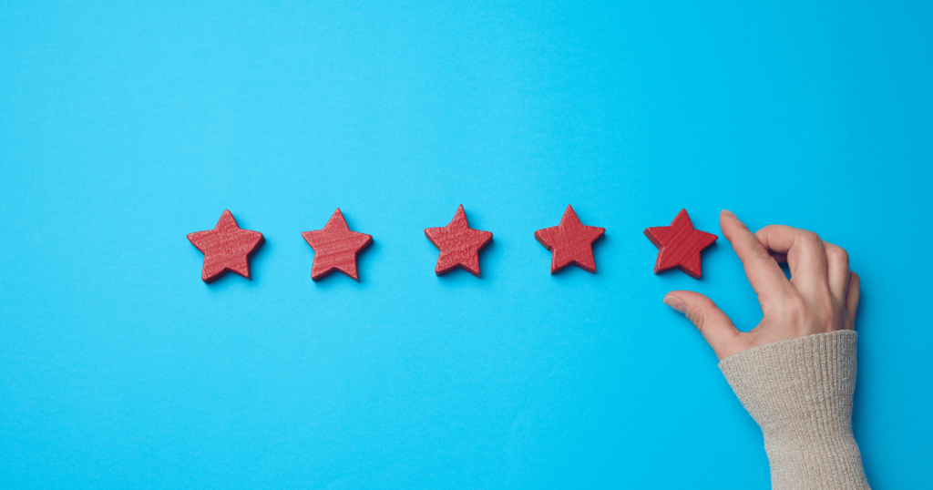 five star review red blocks on blue background